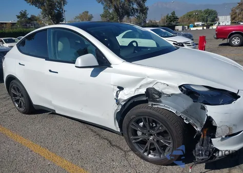 2025 Tesla Model Y Long Range Dual Motor Rear-Wheel Drive from USA, damaged, VIN 7SAYGDED2SF228123